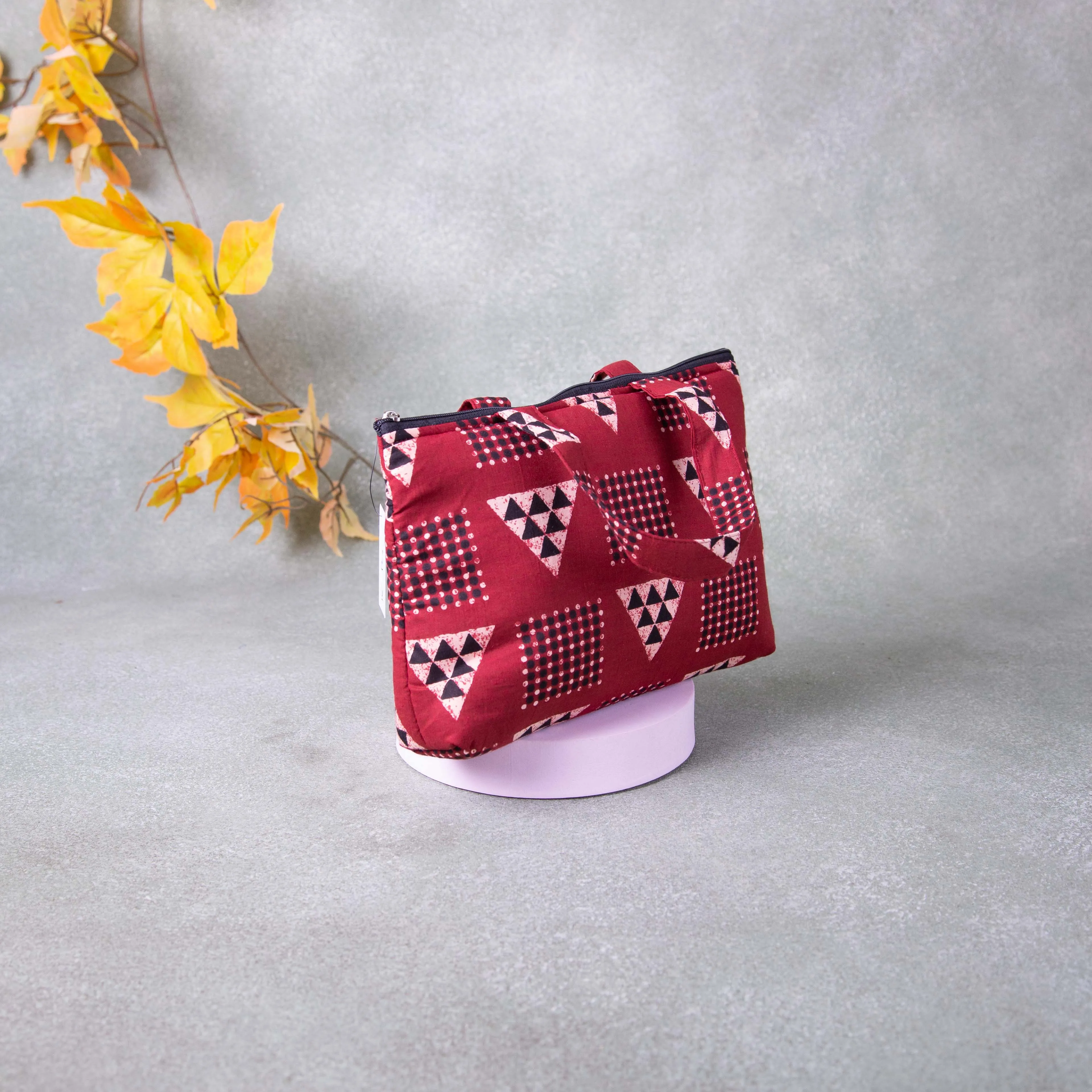 Bristlefront everyday handy bags Red Colour with Black and Sandal Triangle Printed Design.